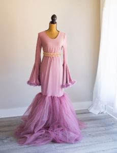 Maternity gown with pink feather at NicCole Photograpy studio