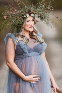 expecting mother on dirt road near Charlotte nc wearing a grey sheer maternity gown