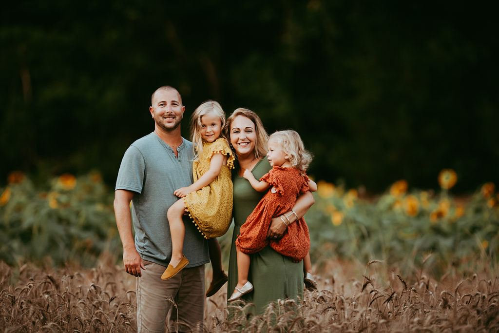 Documentary photos in sunflower field of Charlotte family