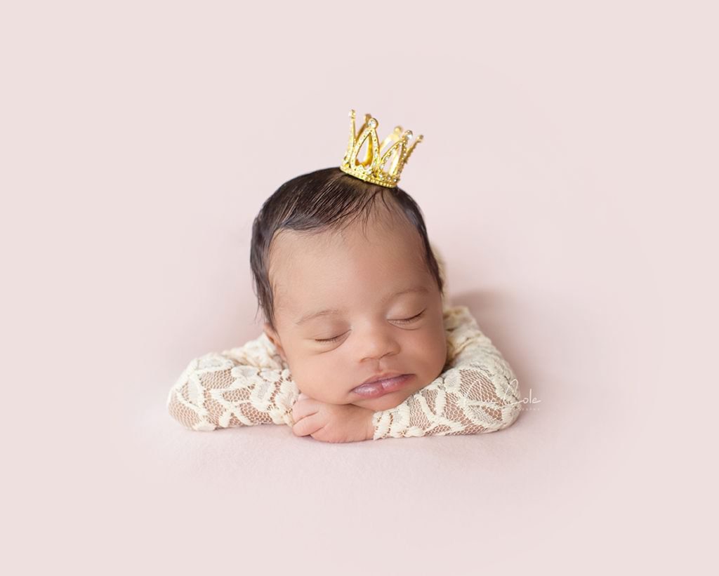 rn baby girl with crown head piece