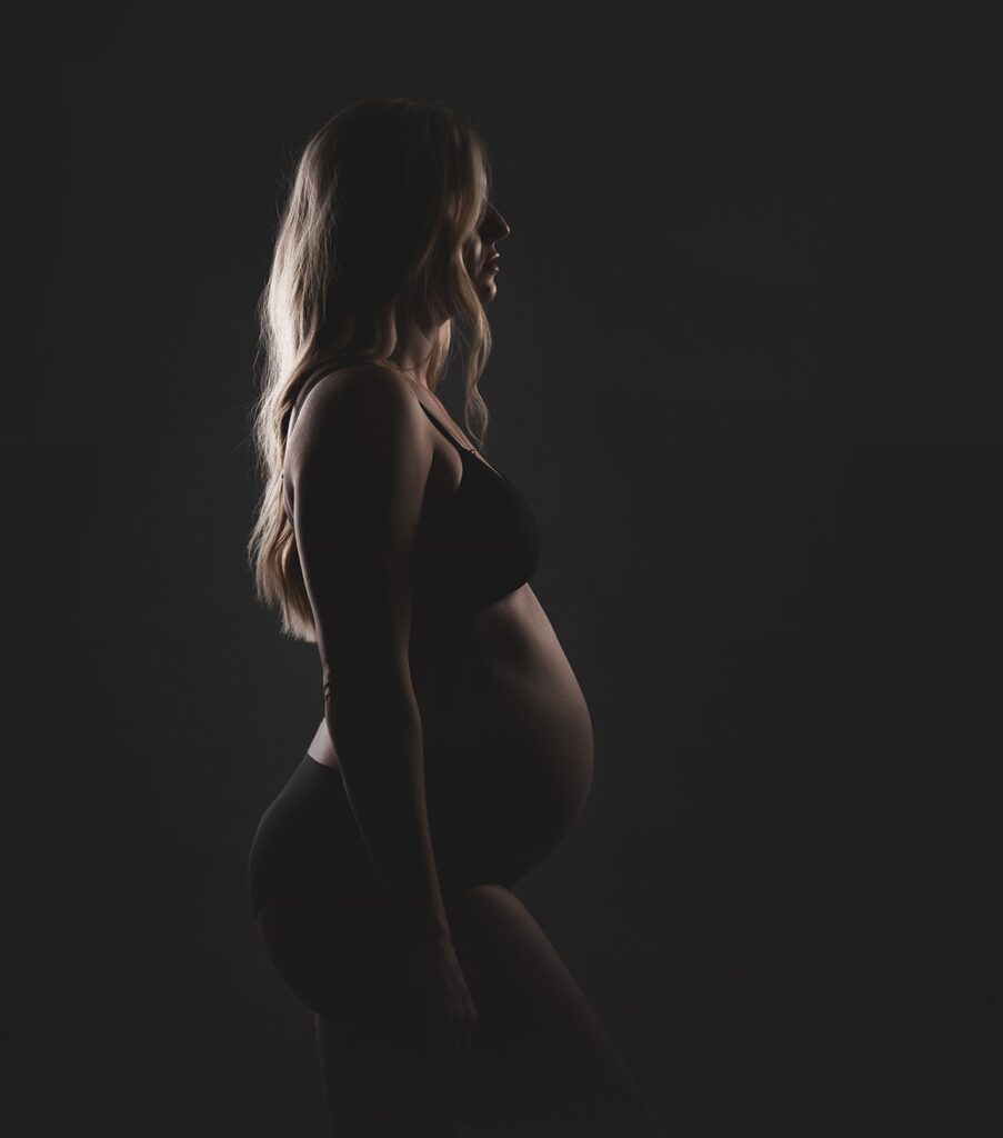 expecting mother in studio light